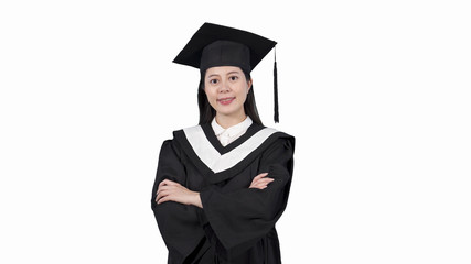 Young asian chinese woman wearing graduate uniform over isolated white background happy face smiling with crossed arms looking at camera. Positive person college student successful done school.