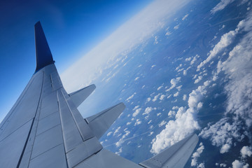 Aerial view of the Earth landscape. Space edge Earth view from airplane porthole with littered...