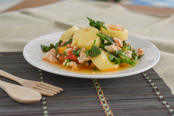 Stir-fries egg tofu with chicken tomato and celery. Homemade food concept 