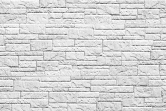 Modern white stone wall pattern and seamless background