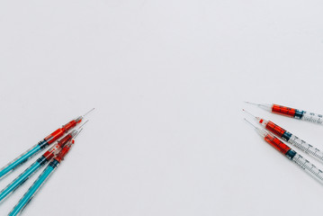 Fototapeta premium Treatment against addiction. Syringe with blood. Immunodeficiency.