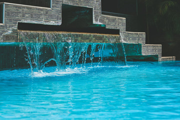 Water flows into the pool in the sport club.