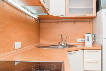 The photo of a sink in a The photo of a sink in a  kitchen