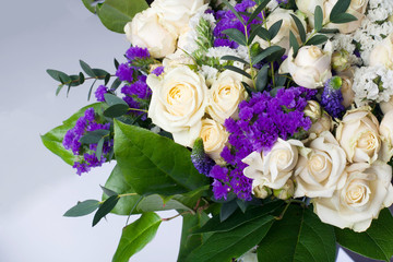 Bright bouquet with white roses close up