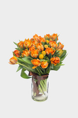 Fototapeta na wymiar Beautiful bouquet with orange tulips close up