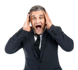 Screaming mature businessman on white background