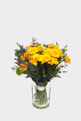 Bright bouquet with yellow roses close up