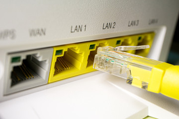 yellow Pat cord is inserted into the free port of the router
