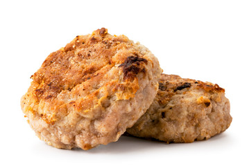 Two homemade cutlets close-up on a white background. Isolated.