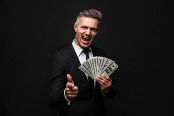 Confident attractive businessman wearing suit