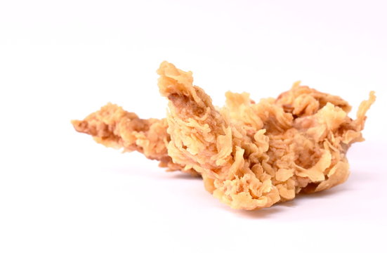 crispy fried chicken fillet with bread crumb and egg yolk on white background