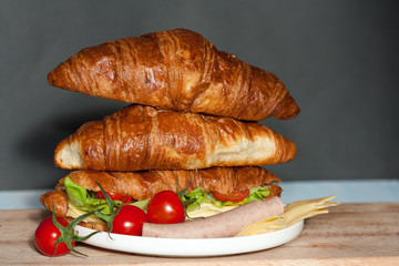 Tasty and colorful croissant sandwiches.