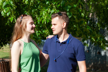 Portrait of beautiful young couple in love in the park.