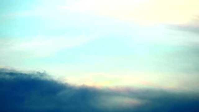 blur rainbow ray on sky and storm cloud moving in evening