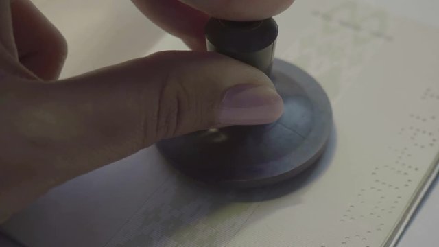 Chop stamp in a travel document passport, entry visa arrival 