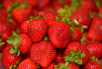 Close up heap of fresh strawberry on retail display