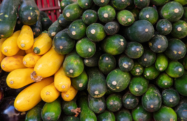 Close up fresh zucchini on retail display