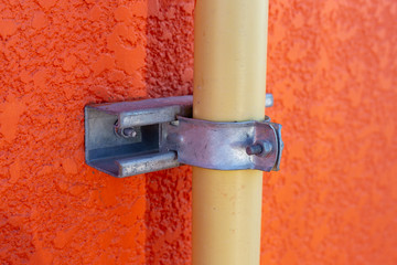 Conduit clamp to fix the EMT or IMC pipe to the wall.