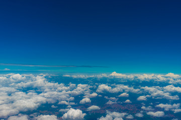 Aerial view blue sky with fluffy cloud