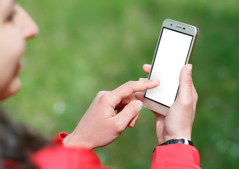 hand is holding smartphone for show and touch with white screen is outdoor