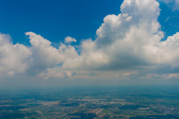 Obraz premium Aerial view blue sky with fluffy cloud