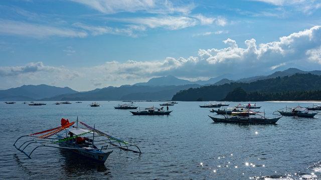 Paraws, double outrigger boats used in hauling tourists to the mouth of underground river in Palawan, UNESCO World Heritage Site as well as well as New7Wonders of Nature.
