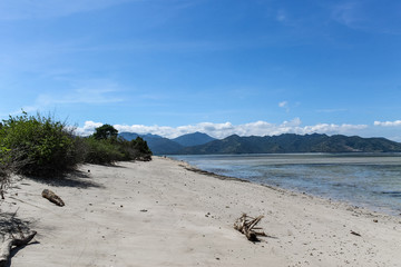 GILI AIR, INDONESIA - December 01, 2013: Pristine Waters and a white Sandy Beach on Gili Air. One of the three popular Gili Islands near Lombok, Indoniesia.