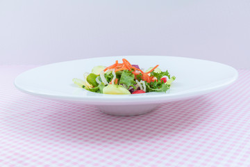 Assorted sprouts salad on a glass plate