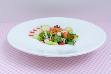 Assorted sprouts salad on a glass plate