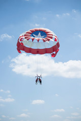 Parasail is flying over the Cancun caribbean sea