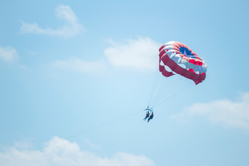 Parasail is flying over the Cancun caribbean sea