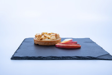 apple pie on a black slate white background