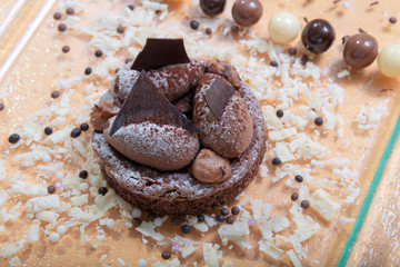 Belgian chocolate cake on brownie cream and white chocolate