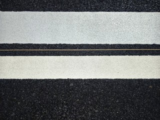 Road traffic paint White on the asphalt surface