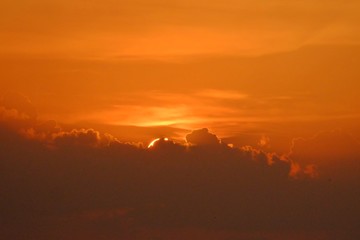 Silhouette sunset with orange sky at dusk for background backdrop 