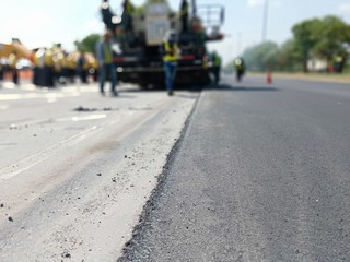 Road maintenance by burning old materials and improving quality