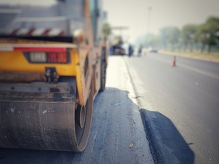 Road maintenance by burning old materials and improving quality