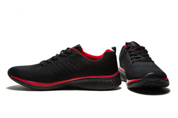 Sport black sneakers isolated on white background