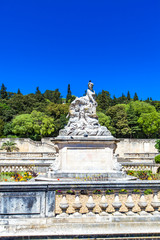 A beautiful fountain in the Jardin de la fontaine in Nimes, France