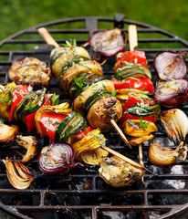 Vegetarian skewers, grilled vegetable skewers of zucchini, peppers and potatoes with the addition...