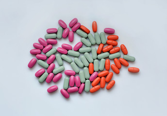 Stack of different pills isolated on white background