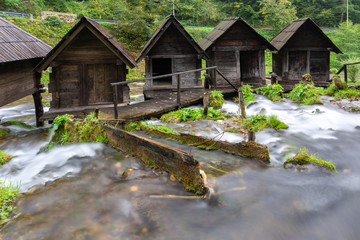 Fototapeta na wymiar Old wooden water mills of Jajce, Bosnia and Herzegovina