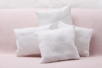 Fototapeta na wymiar Stack of simple white pillows