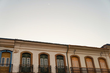 Historical facades with moon at Ouro Preto, Minas Gerais, Brazil                               
