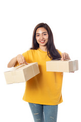Asian smiling women holding a paper box package on a white background. Delivery concept.