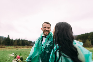 couple in love walking in the rain, ore life and relax together