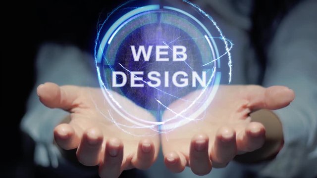 Female hands show a round conceptual hologram with text Web Design. Unrecognizable woman in ashen white on a black background with future holographic technology