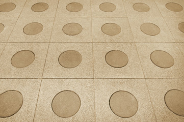 Old beige stone pavement background texture