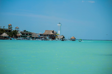 Port and lighthouse somewhere on the caribbean sea