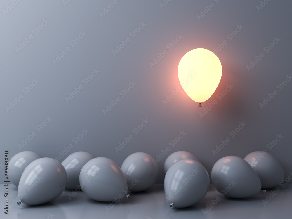 Leinwandbilder stand out from the crowd and different concepts one light balloon glowing and floating above other w